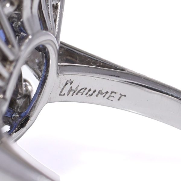 Sapphire and diamond cluster ring in white gold.