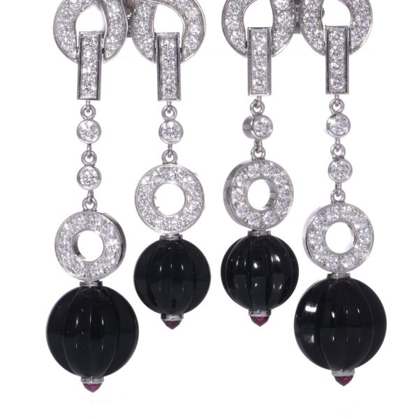 Cartier white gold earrings with diamonds, sapphires and rubies.