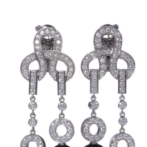 Cartier white gold earrings with diamonds, sapphires and rubies.