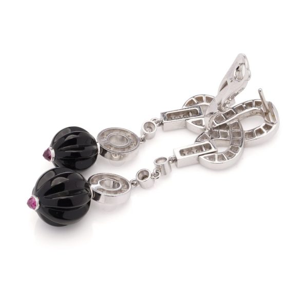 Cartier white gold earrings with diamonds, sapphires and rubies.