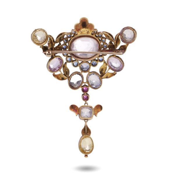 Victorian gemstone and enamel brooch in gold.