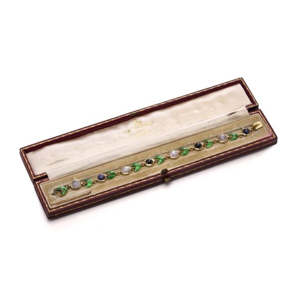 Victorian gold bracelet with enamel, sapphires and moonstones.
