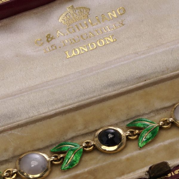 Victorian gold bracelet with enamel, sapphires and moonstones.