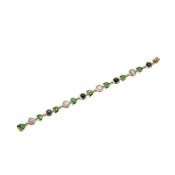 Victorian gold bracelet with enamel, sapphires and moonstones.