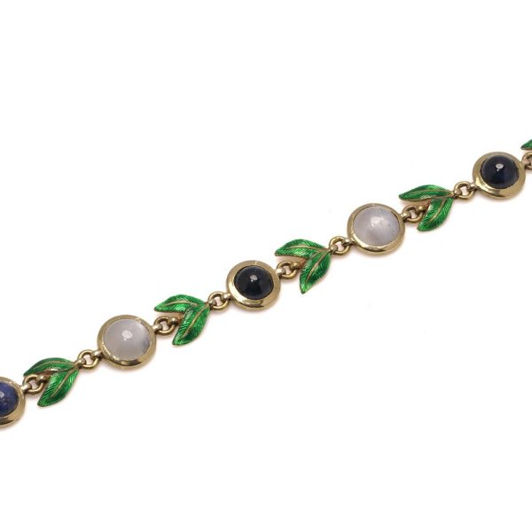 Victorian gold bracelet with enamel, sapphires and moonstones.