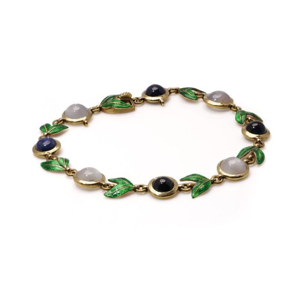 Victorian gold bracelet with enamel, sapphires and moonstones.