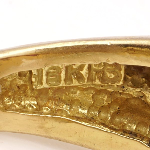 Kutchinsky ruby and diamond cocktail ring in gold.