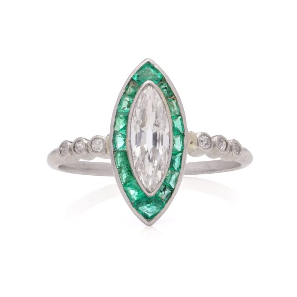 Vintage diamond and emerald ring in platinum.