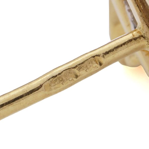 Diamond drop earrings in yellow and white gold.