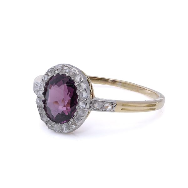 Spinel and diamond cluster ring in gold and platinum.