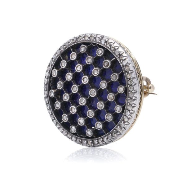 Victorian diamond and enamel brooch in gold and silver.