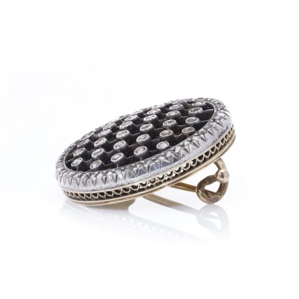 Victorian diamond and enamel brooch in gold and silver.