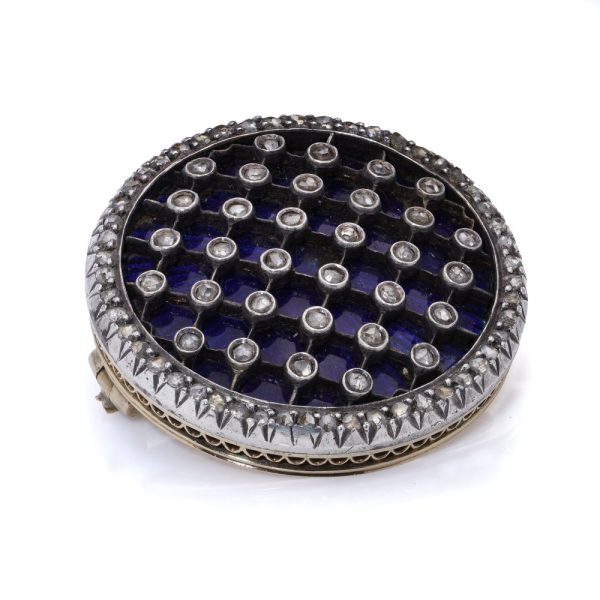 Victorian diamond and enamel brooch in gold and silver.
