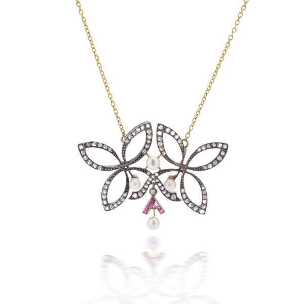 Victorian diamond, ruby and pearl pendant in gold and silver.
