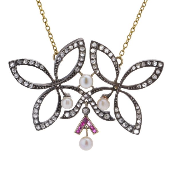 Victorian diamond, ruby and pearl pendant in gold and silver.