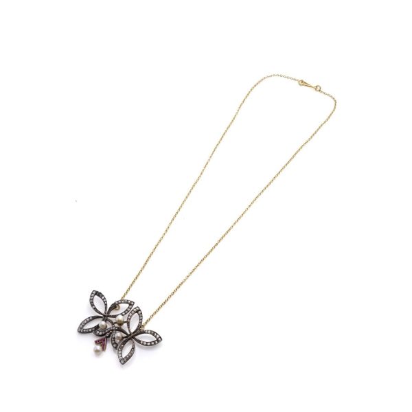 Victorian diamond, ruby and pearl pendant in gold and silver.
