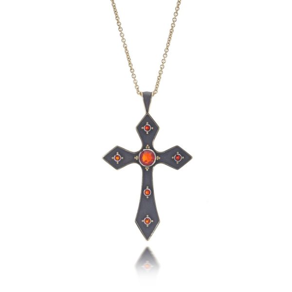 Gold cross pendant featuring vivid fire opals.