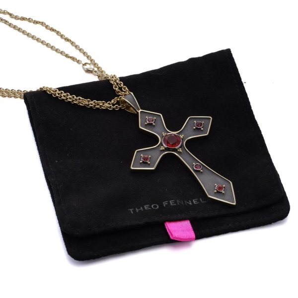 Gold cross pendant featuring vivid fire opals.