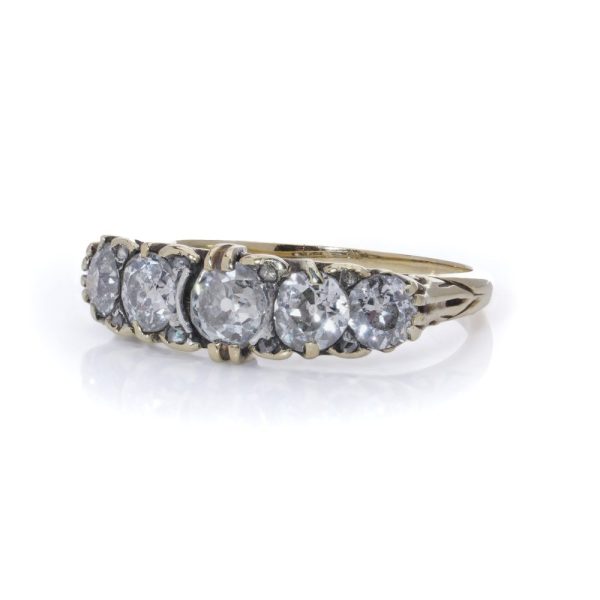 Victorian old cut diamond five stone ring in gold.