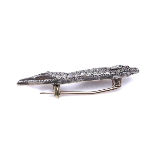 Antique gold and silver greyhound brooch with diamonds and ruby.