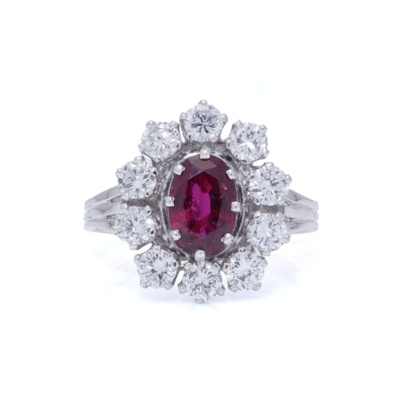 Vintage ruby and diamond cluster ring in gold.