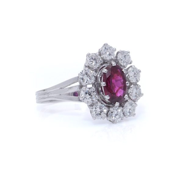 Vintage ruby and diamond cluster ring in gold.