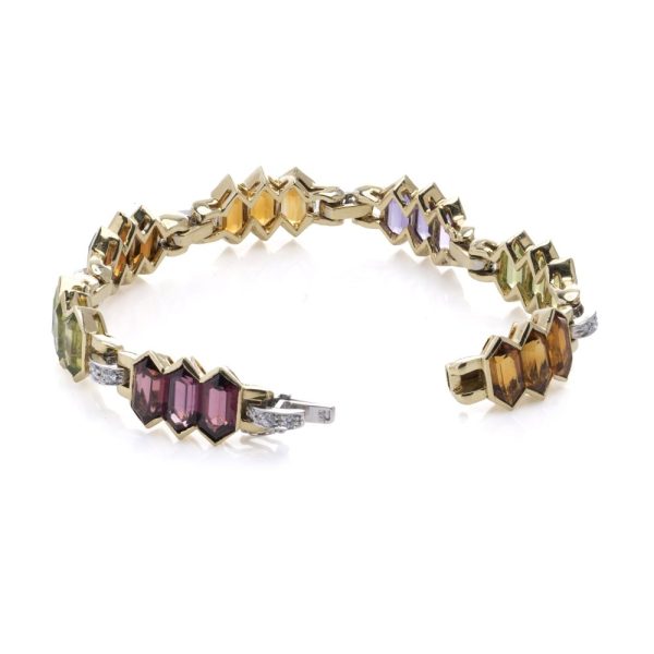 Bulgari 18 carat gold bracelet with multicoloured gemstones and diamonds. 