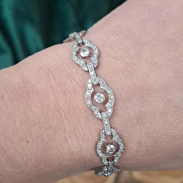 Antique French 2ct Diamond Cluster Link Bracelet, floral quatrefoil links set with an estimated 2 carats of old-cut diamonds in platinum and 18ct white gold