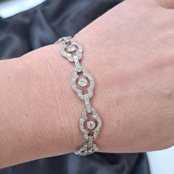 Antique French 2ct Diamond Cluster Link Bracelet, floral quatrefoil links set with an estimated 2 carats of old-cut diamonds in platinum and 18ct white gold