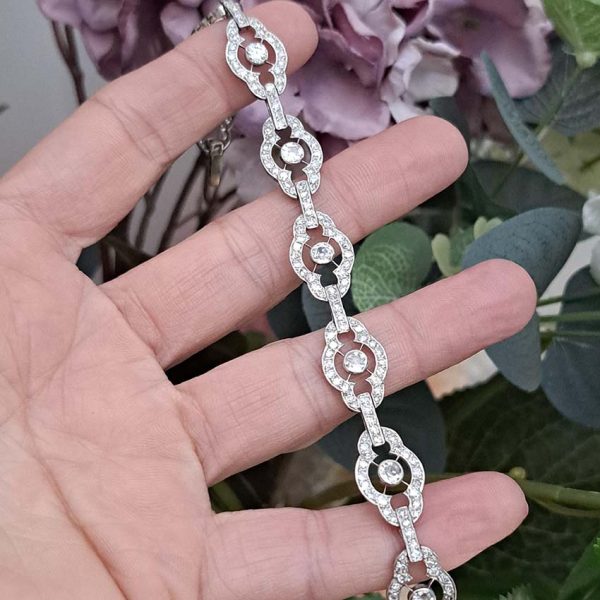 Antique French 2ct Diamond Cluster Link Bracelet, floral quatrefoil links set with an estimated 2 carats of old-cut diamonds in platinum and 18ct white gold