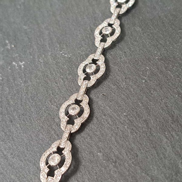 Antique French 2ct Diamond Cluster Link Bracelet, floral quatrefoil links set with an estimated 2 carats of old-cut diamonds in platinum and 18ct white gold