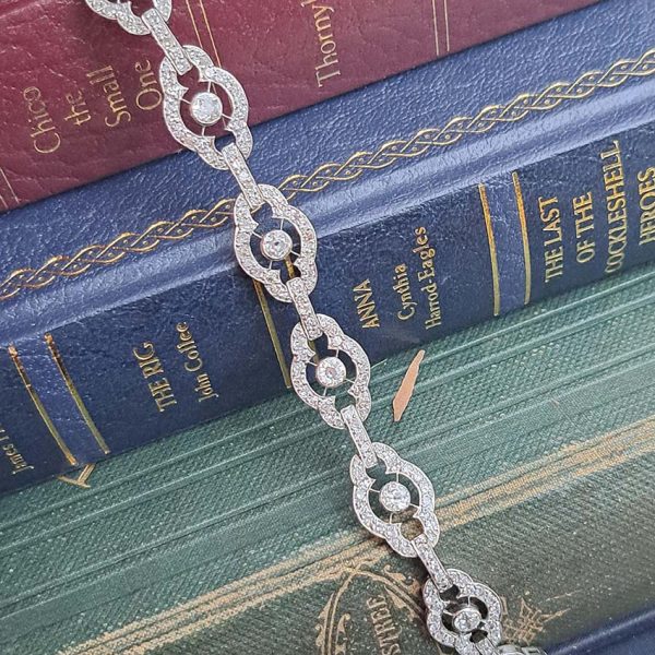 Antique French 2ct Diamond Cluster Link Bracelet, floral quatrefoil links set with an estimated 2 carats of old-cut diamonds in platinum and 18ct white gold