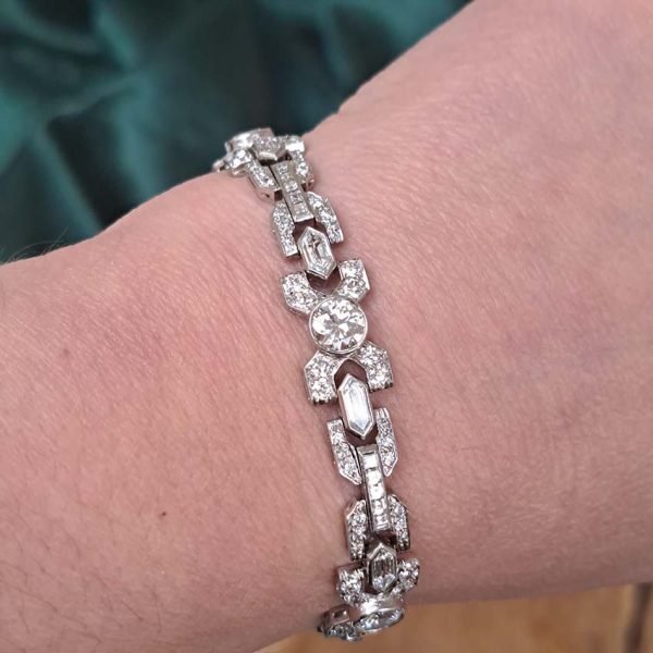 Vintage Diamond X Cross Link Bracelet, 9 carat total, set with 9 carats of transitional-cut, old-cut, square princess-cut and long hexagonal facetted cut diamonds in 14ct white gold