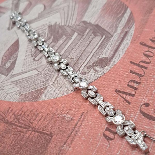 Vintage Diamond X Cross Link Bracelet, 9 carat total, set with 9 carats of transitional-cut, old-cut, square princess-cut and long hexagonal facetted cut diamonds in 14ct white gold