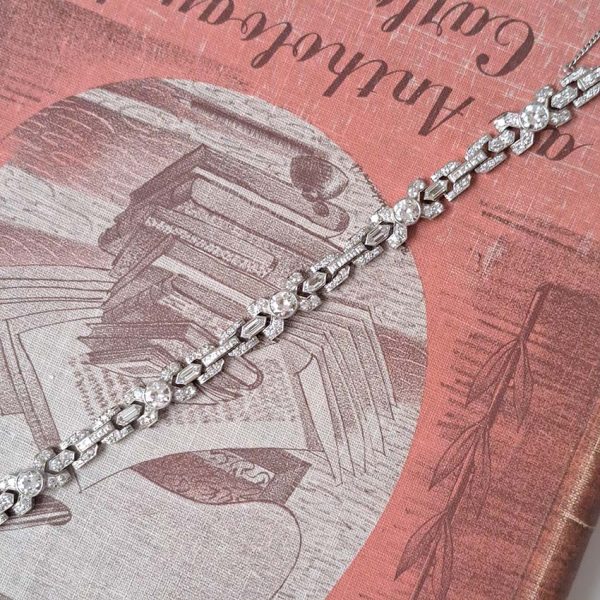 Vintage Diamond X Cross Link Bracelet, 9 carat total, set with 9 carats of transitional-cut, old-cut, square princess-cut and long hexagonal facetted cut diamonds in 14ct white gold