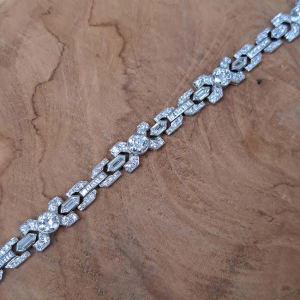 Vintage Diamond X Cross Link Bracelet, 9 carat total, set with 9 carats of transitional-cut, old-cut, square princess-cut and long hexagonal facetted cut diamonds in 14ct white gold