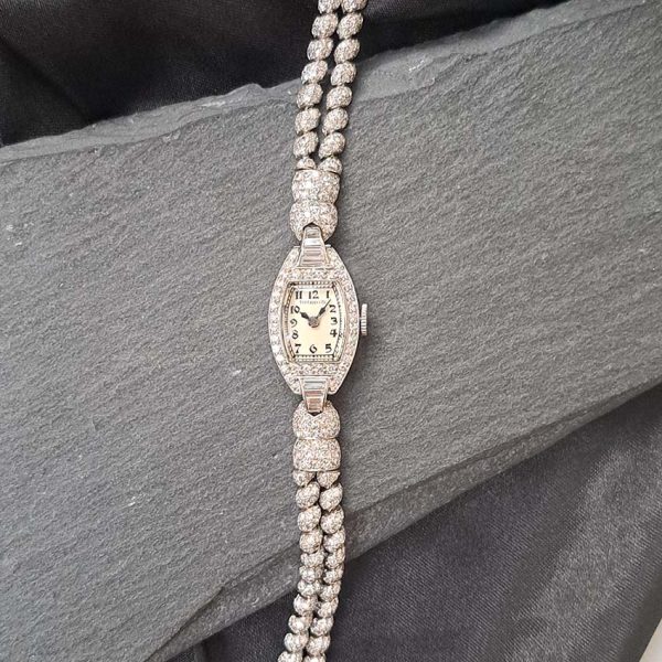 Art Deco Tiffany and Co Diamond Cocktail Watch, vintage Tiffany & Co ladies platinum watch set throughout with sparkling eight-cut and single-cut diamonds with rope twist design bracelet strap