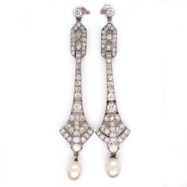 Antique Art Deco Natural Pearl and Diamond Drop Earrings, graduated geometric designs studded with 2 carats of sparkling diamonds leading to natural pearl pendant drops in platinum