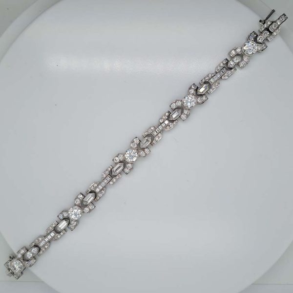 Vintage Diamond X Cross Link Bracelet, 9 carat total, set with 9 carats of transitional-cut, old-cut, square princess-cut and long hexagonal facetted cut diamonds in 14ct white gold