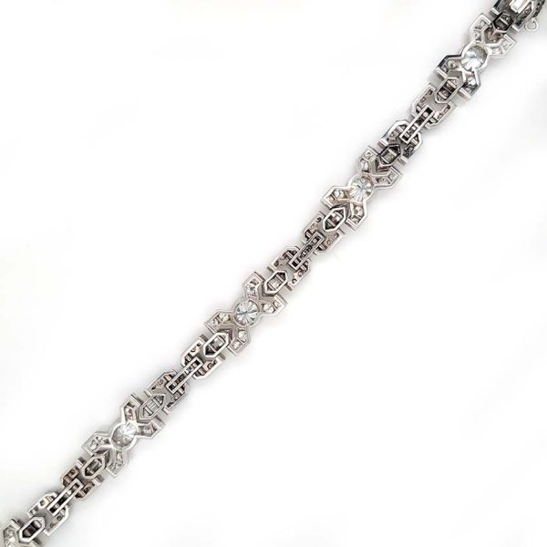 Vintage Diamond X Cross Link Bracelet, 9 carat total, set with 9 carats of transitional-cut, old-cut, square princess-cut and long hexagonal facetted cut diamonds in 14ct white gold