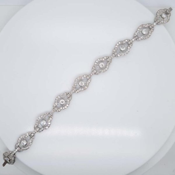 Antique French 2ct Diamond Cluster Link Bracelet, floral quatrefoil links set with an estimated 2 carats of old-cut diamonds in platinum and 18ct white gold