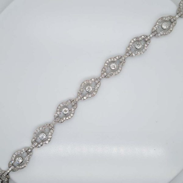 Antique French 2ct Diamond Cluster Link Bracelet, floral quatrefoil links set with an estimated 2 carats of old-cut diamonds in platinum and 18ct white gold