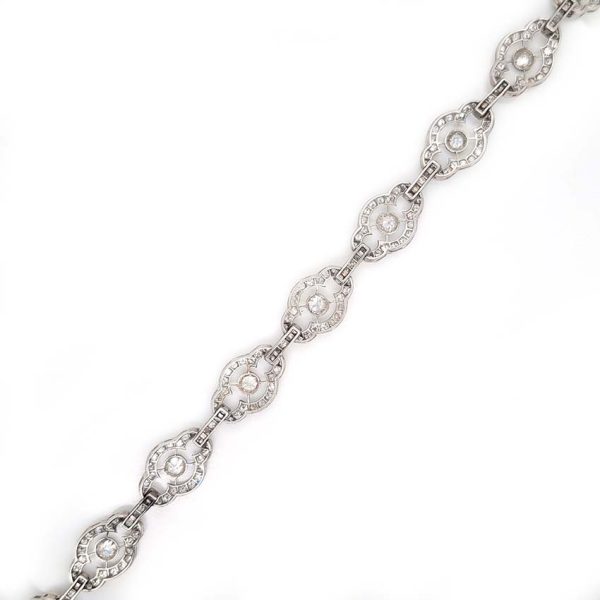 Antique French 2ct Diamond Cluster Link Bracelet, floral quatrefoil links set with an estimated 2 carats of old-cut diamonds in platinum and 18ct white gold