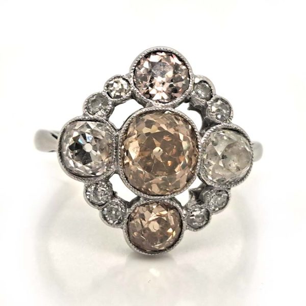 Antique 3.7cts Fancy Champagne Diamond Quatrefoil Ring, 1.57ct old mine-cut champagne diamond surrounded by four further old mine-cut diamonds of varying champagne hues arranged at the four compass points, with smaller old-cut diamond accents between in platinum and 18ct white gold