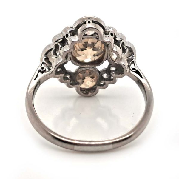 Antique 3.7cts Fancy Champagne Diamond Quatrefoil Ring, 1.57ct old mine-cut champagne diamond surrounded by four further old mine-cut diamonds of varying champagne hues arranged at the four compass points, with smaller old-cut diamond accents between in platinum and 18ct white gold