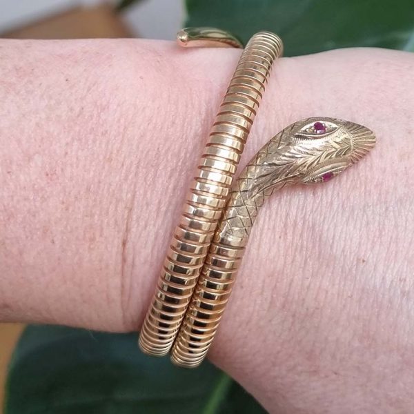 Vintage 9ct Yellow Gold Coiled Snake Bracelet, The coiled serpent's body wraps around the wearer's wrist. Circa 1970's