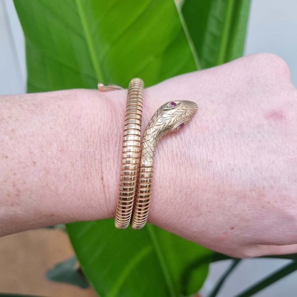 Vintage 9ct Yellow Gold Coiled Snake Bracelet, The coiled serpent's body wraps around the wearer's wrist. Circa 1970's