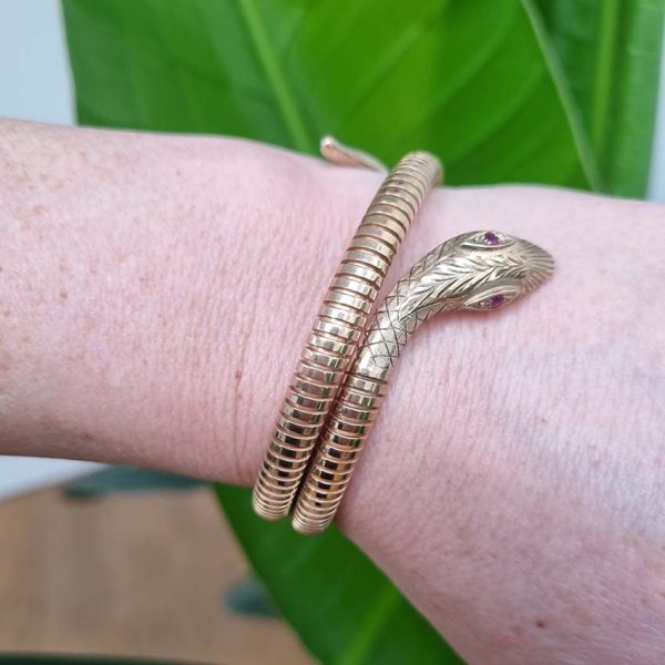 Vintage 9ct Yellow Gold Coiled Snake Bracelet, The coiled serpent's body wraps around the wearer's wrist. Circa 1970's