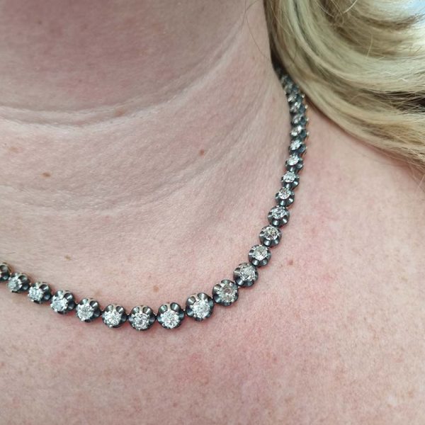 Antique 10.7ct Old Cut Diamond Line Necklace, 73 graduating old mine-cut diamonds in individual crown settings in silver upon yellow gold, 43.3cm long