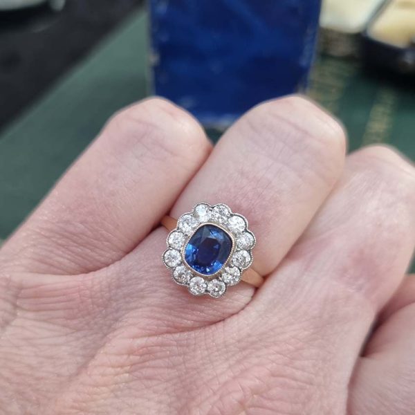 Vintage 1.07ct Cushion Cut Sapphire and Old Cut Diamond Flower Cluster Engagement Ring in platinum to 18ct yellow gold